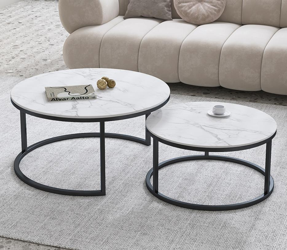 Modern minimalist style living room with round marble coffee table. Small-sized room. Nordic style balcony. Trendy and simple small tea table.