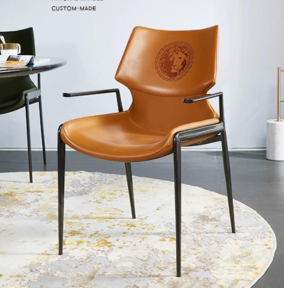 Italian minimalist light luxury high-end genuine leather dining chair for home use with armrest and backrest. Designer style tea table chair.