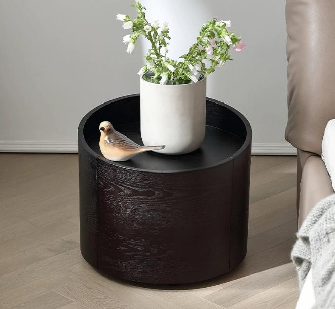 Italian minimalist round bedside table, smoked color bedside cabinet, low-profile floor-standing storage cabinet, designer storage cabinet.