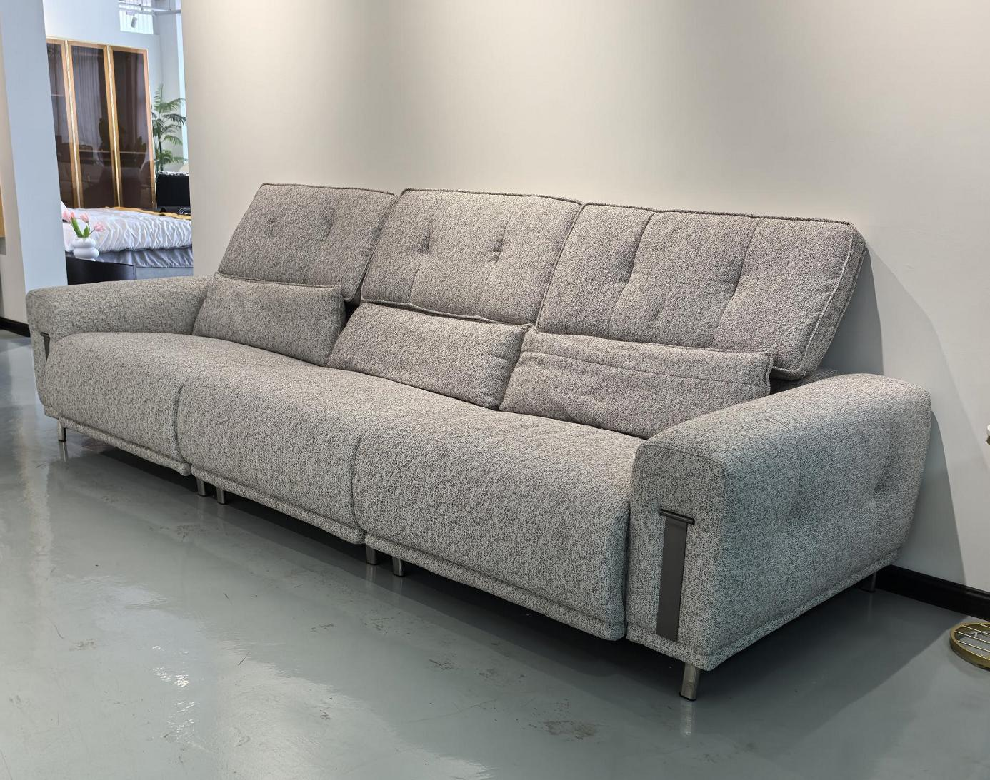 Modern minimalist cotton and linen three-seater high-end sofa for a living room with deep seat and straight row arrangement