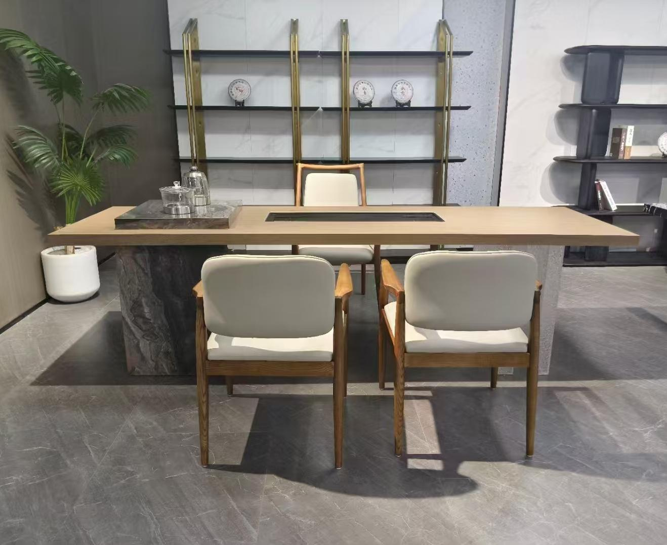 A new Chinese-style living room table for boiling water and brewing tea, featuring a Zen-like wooden large board tea table.