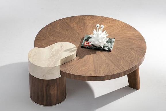 Minimalist modern round-shaped creative E1 solid wood veneer coffee table for small-sized living room in small space, suitable for home use, designed by a designer, with a sense of sophistication.