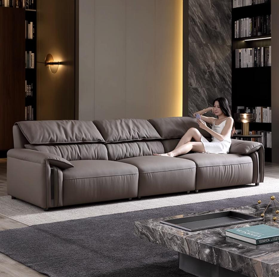 Soft leather sofa with soft down pillow backrest, comfortable like elephant ears.